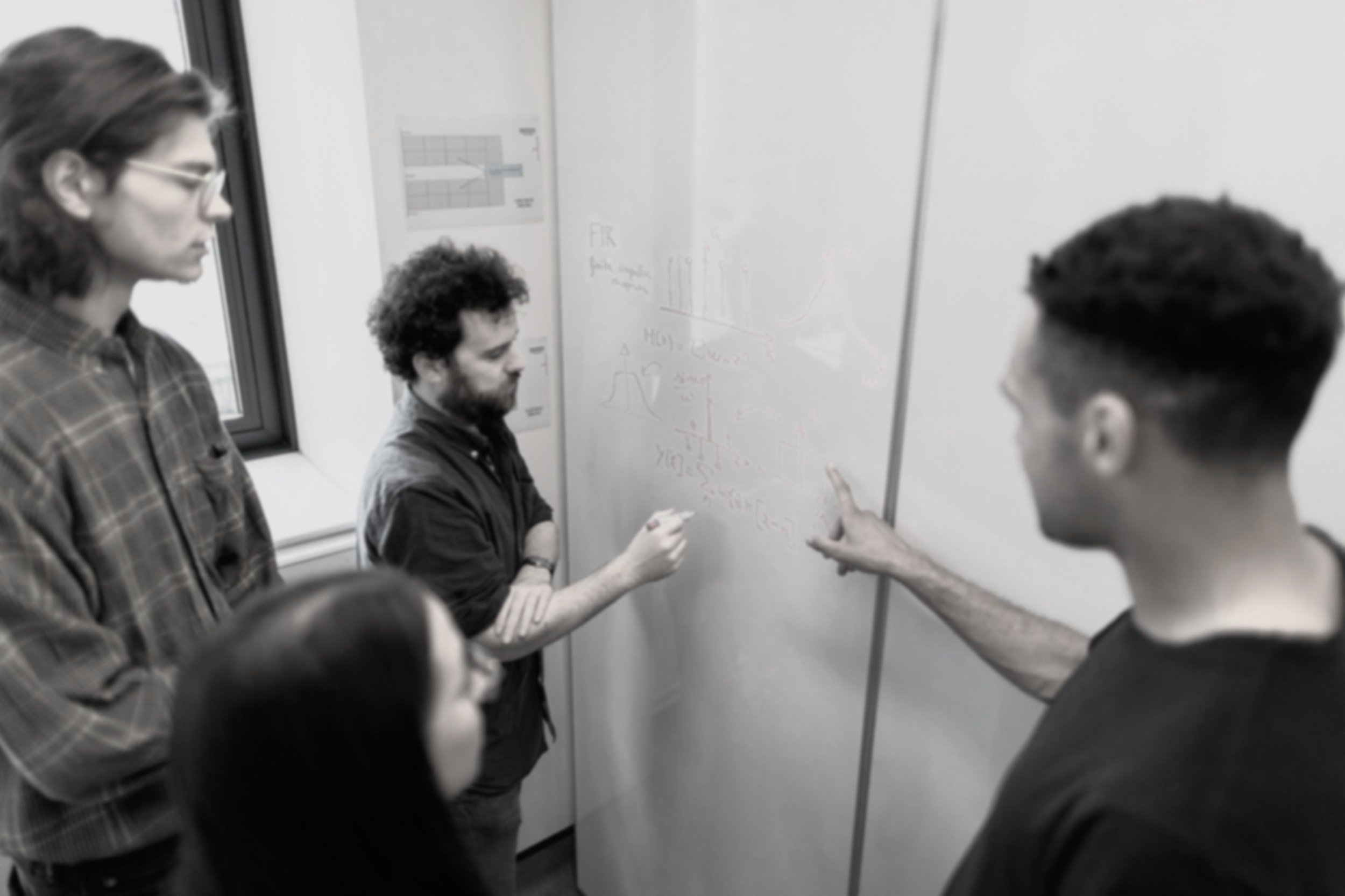 Portrait-style workspace photo representing the CyberCloud IQ team